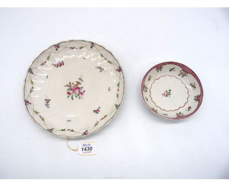 A New Hall porcelain plate and saucer, the plate with floral design and dotted wavy line to the edge, the saucer with floral 