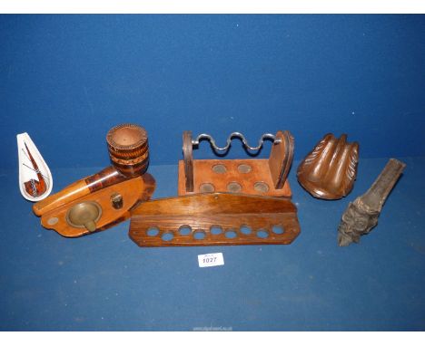 A box of pipe stands and racks including a leather covered stand, a huge pipe ashtray, carved twin pipe stand etc.