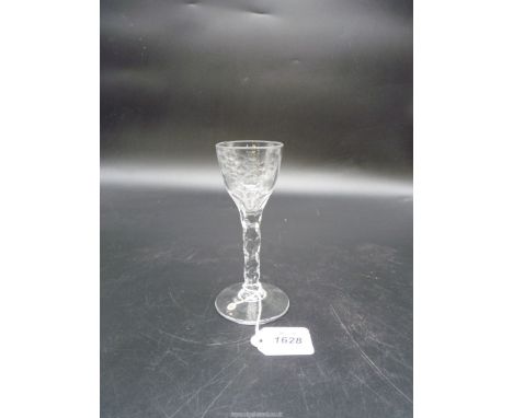 An 18th c. Cordial Glass the bowl finely engraved with rose flowers and buds above a faceted stem (old collectors ticket to b