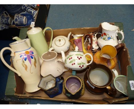 A quantity of jugs and teapots including Mason's, Tunstall, Aynsley, Poole etc.