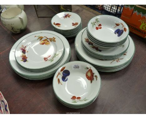 A quantity of Royal Worcester Evesham Vale china including eight dinner plates (10 3/4"), eight saucers, eight bowls and eigh