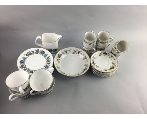 ROYAL DOULTON TEA SERVICE, with floral decoration, comprising 8 trios, sugar, cream and side plate, along with a Royal Doulto