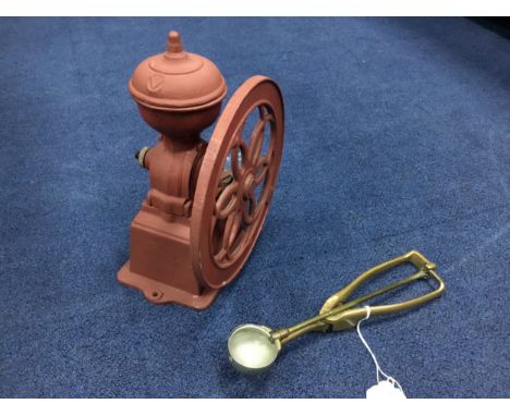 VINTAGE BRASS ICECREAM SCOOP, inscribed 'Gilchrist' 24.5cm long, along with a vintage coffee grinder