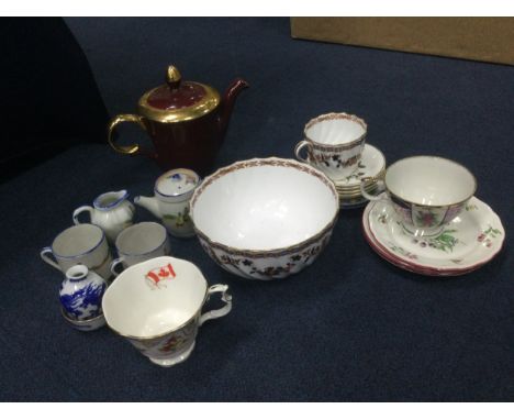 LOT OF CERAMIC TEA POTS, CUPS AND SAUCERS, along with other tea ware