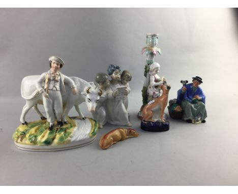 ROYAL DOULTON FIGURE OF 'TUPPANCE A BAG', HN 2320, along with a Lladro figure group of three singing angels, a Staffordshire 