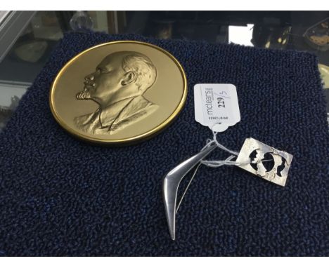 SCOTTISH SILVER BROOCH, along with a Danish silver 'boomerang' brooch and a giltmetal bust of Lenin (3)