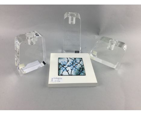 THREE MARC AUREL GLASS CANDLESTICKS, along with an art tile by Carole Allen (4)
