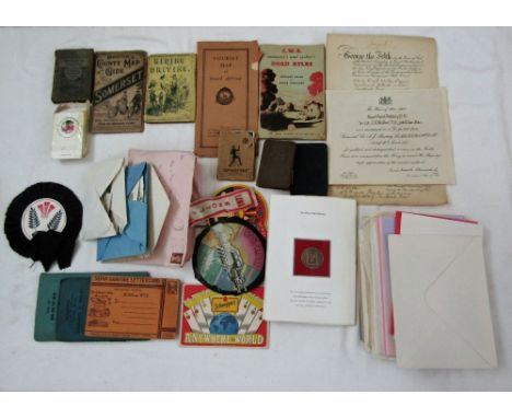 A box containing a miscellaneous collection of items including a George V Distinguished Service Order Presentation Document t