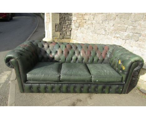 A traditional green leather upholstered three seat Chesterfield sofa with button back and loose seat cushions, 200 cm long ap