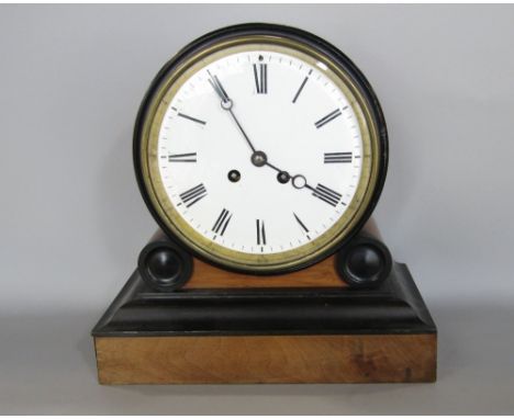 Regency style walnut and ebonised drum head mantel clock, the enamelled dial with two train movement and Roman numerals, 27cm