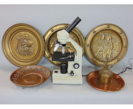 A cased Moti microscope with various further lenses and others