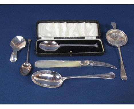 An interesting collection of antique silver spoons to include a Georgian silver caddy spoon, maker I T, a knop end teaspoon, 