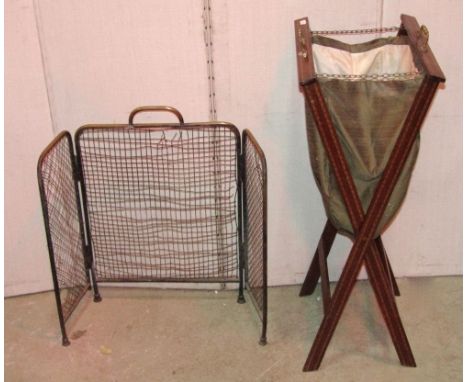 A hardwood pierced two handled butlers’ tray of rectangular form and folding stand together with an inlaid Edwardian x framed