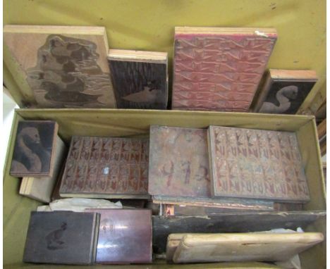 A metal trunk containing a large collection of copper printing blocks and plates all relating to Peter Scott including signed