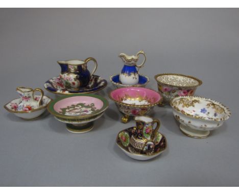 A collection of 19th century miniature ceramics comprising a blue ground jug and basin set, with painted floral sprays in the