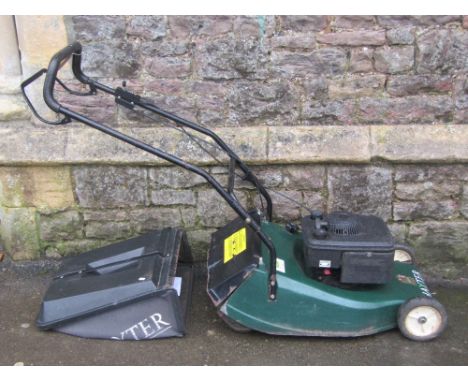 A Hayter Harrier 48, petrol driven, rotary lawn mower, with rear roller and grass collection bag