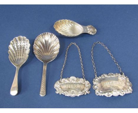 Three silver caddy spoons to include a Georgian style spoon with scallop shell bowl and cast scallop shell thumb piece, furth