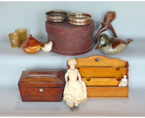 A good box of interesting items to include a rosewood sarcophagus box, nutcracker, decoy duck, porcelain dolls, waterfall sta