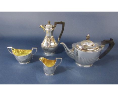 Georgian style three piece half fluted tea service comprising teapot, water pot, milk jug and sucrier, with gilt interior, ma