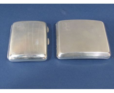 Two silver hip shaped card cases one with engine turned decoration and push hinge, 6 oz approx. (2)