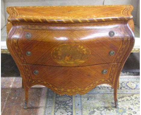 A continental bombe shaped commode, with repeating marquetry and other decoration, enclosing three drawers, 120cm wide