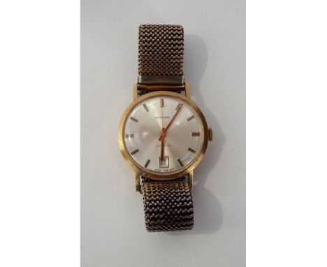 Vintage 9ct gent's Garrard automatic wristwatch, the silvered dial with date aperture and baton markers, upon an associated p