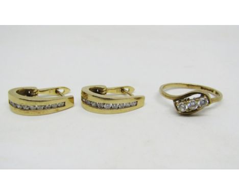 Pair of 9ct channel set diamond earrings, together with a 9ct paste set crossover ring, 6.2g total (3)