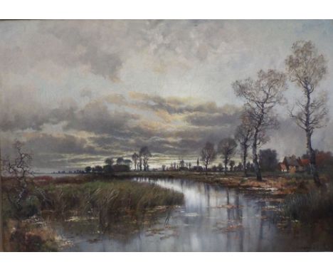 K Wittmann (Early 20th century continental school) - Extensive river landscape with distant windmill, oil on canvas, signed, 