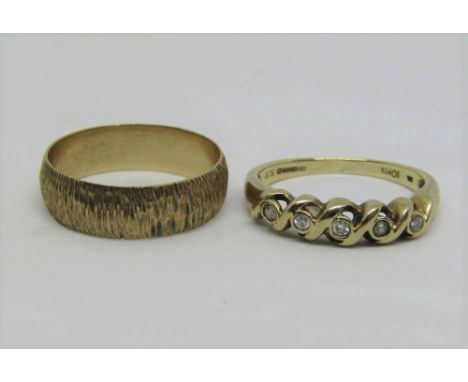 Two 9ct rings; a diamond set example and a textured wedding ring, 5.2g total (2)