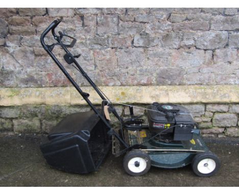 A Hayter Hayterette, petrol driven, rotary lawn mower, powered by a Briggs and Stratton engine