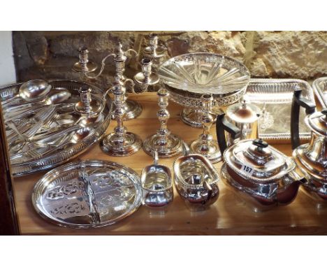 Large collection of silver-plated flatware to include four-piece boat shaped tea service, entree dishes, tazzas, candelabra, 