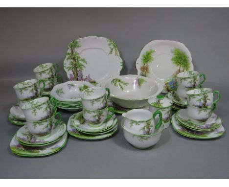 A collection of Royal Albert Greenwood Tree pattern wares comprising dessert serving bowl and six dishes, jam pot and cover, 