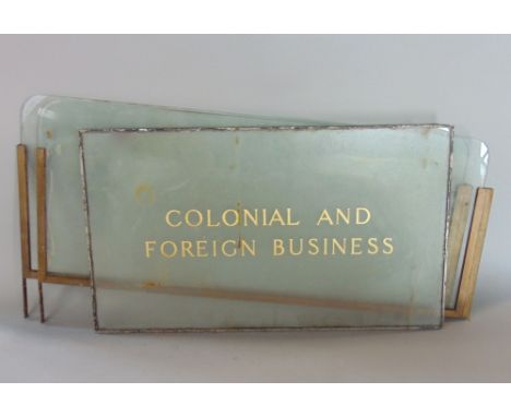 Vintage inscribed glass panel, with gilt lettering " Colonial and foreign business", 59 x 35 cm, together with two further go