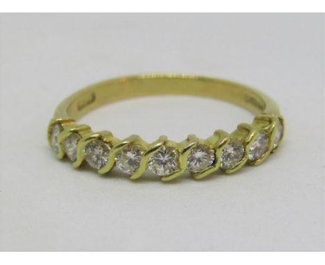 Stylised 18ct diamond half hoop ring, size J/K, 1.9g