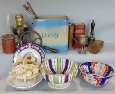 A mixed collection of miscellaneous items to include a lidded terracotta tobacco jar, decorated with humorous dogs, Chinese c