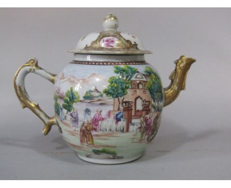 An early 19th century Cantonese teapot of globular form with polychrome painted landscape and figure decoration, with rustic 