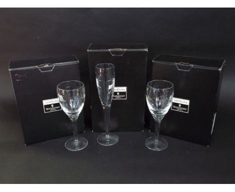 Three boxed pairs of John Rocha Waterford crystal goblets, comprising four wine glasses and two flutes (6)