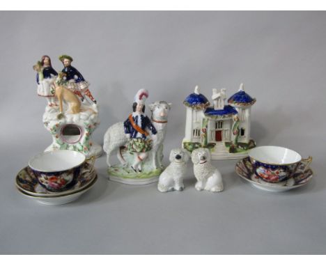 A collection of 19th century Staffordshire wares including a watch holder surmounted by a pair of highland characters and a g