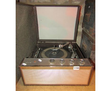 A vintage HMV 2012 mains record player, with Garrard model 2000 turntable