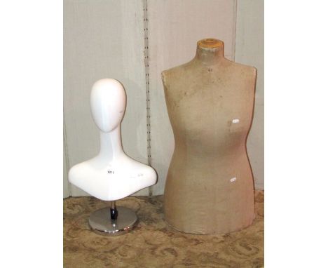 A vintage tailors dummy (half female torso) together with a modernist table top head and shoulder bust, raised on a circular 