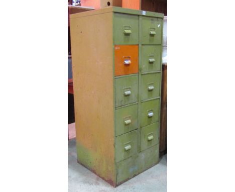A vintage floor standing steel filing cabinet, fitted with a side by side arrangement of 10 index drawers, with painted finis