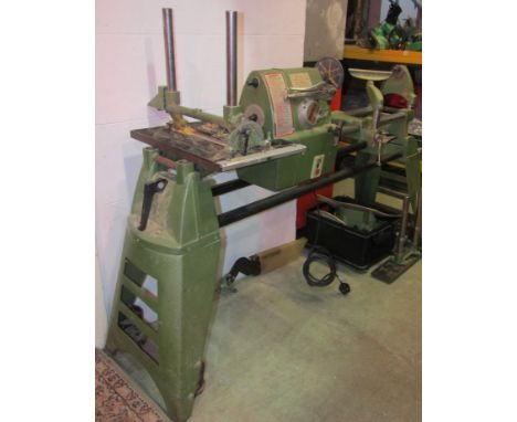 A Multico Pro-mex multi shop wood turning lathe, drill and saw bench and accessories