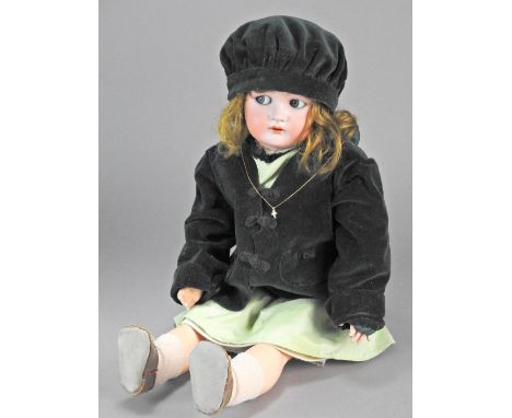 A Simon and Halbig (K&R) bisque porcelain head doll, wearing light brown wig, with flirty weighted blue glass eyes, pierced e