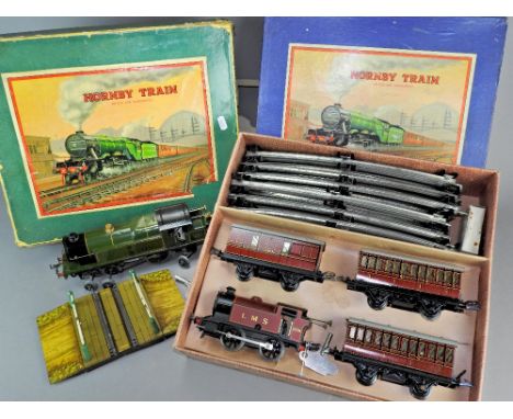 Hornby O Gauge Pre-War boxed Passenger set 101: LMS 0-4-0 Tank Engine, 3 x LMS tin plate Coaches with track and key also Horn