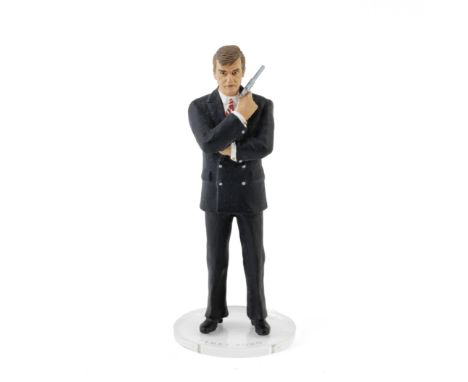 A Corgi 'icon' figure of Sir Roger Moore as James Bond, and an Eaglemoss die-cast scale model of the Citroen 2CV in For Your 