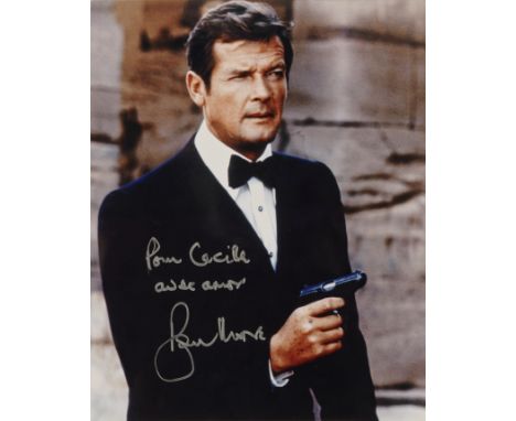 A signed colour photograph of Sir Roger Moore as James Bond in The Spy Who Loved MeA reproduction colour photographic print s