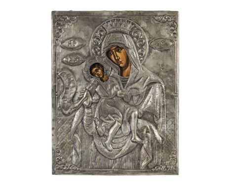 Two icons of the Madonna and Child20th centuryOne with white metal repoussé decoration and painted faces, indistinctly hallma