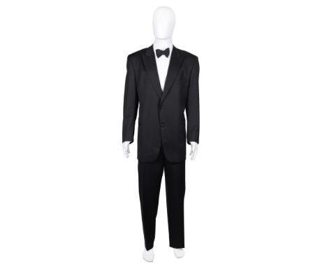 A Joseph Abboud wool and silk single breasted twin button dinner suit for Sir Roger MooreLabelled 'Joseph Abboud', with cover