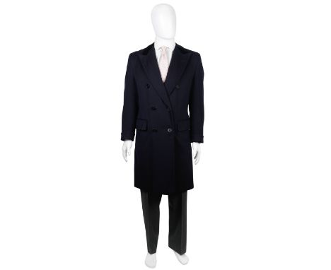 A Cyril Castle navy cashmere double-breasted Chesterfield coat made for Sir Roger Moore in Live And Let Die1973Comprising a n