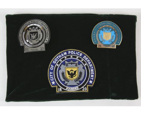 The Dark Knight Rises (2012)  a group of three Gotham Police Department badges, two being metal and one being an embroidered 
